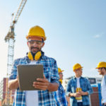 construction manager in yellow hard hat