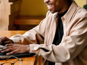 small business owner typing on computer